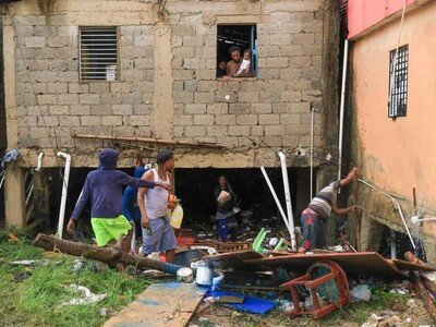 Photo of LLuvias causan inundaciones y daños materiales en el barrio Las 800